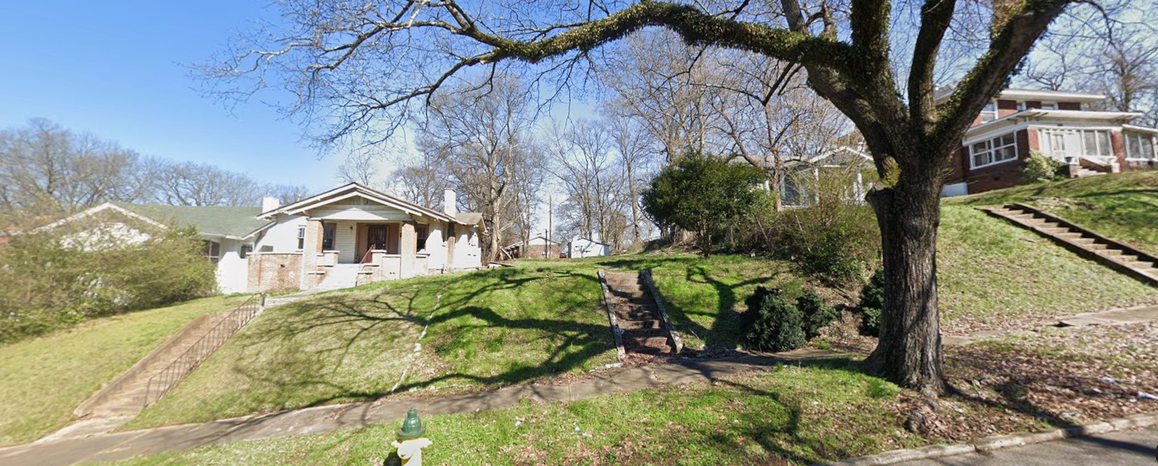 Before: a vacant Northside lot filled with a new craftsman-style house that fits the block